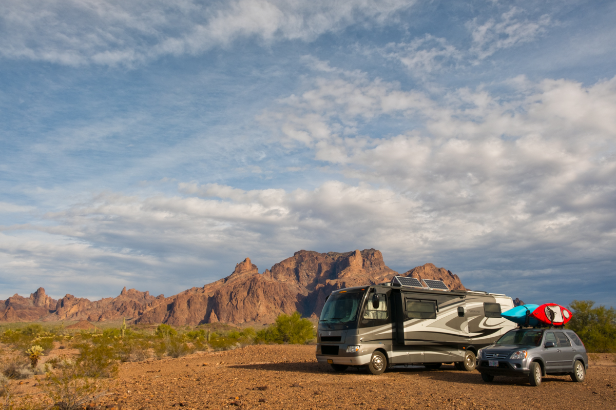 Our RV home on wheels and tow vehicle camping at the KOFA National Wildlife Refuge in southern Arizona.